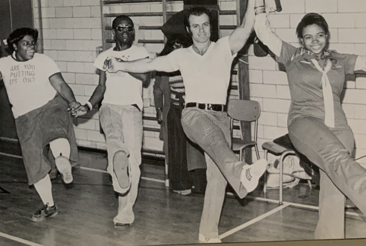 spalding students in the 70s, holding hands and dancing